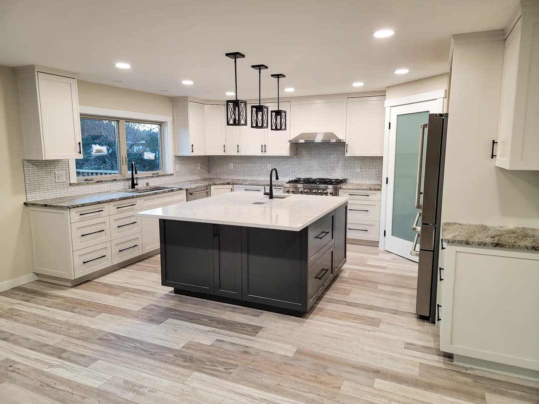 a finished kitchen with cabinets